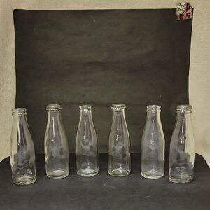 VINTAGE 1961 SMALL 6 OUNCE NORTHWESTERN GLASS CO. GLASS BOTTLE - 5 1/2" 'X 2"